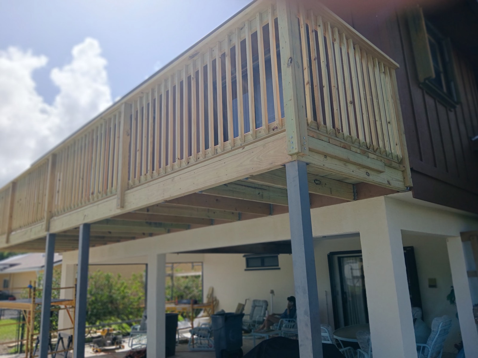One of the two rebuilt pressure-treated decks, framed and railed.