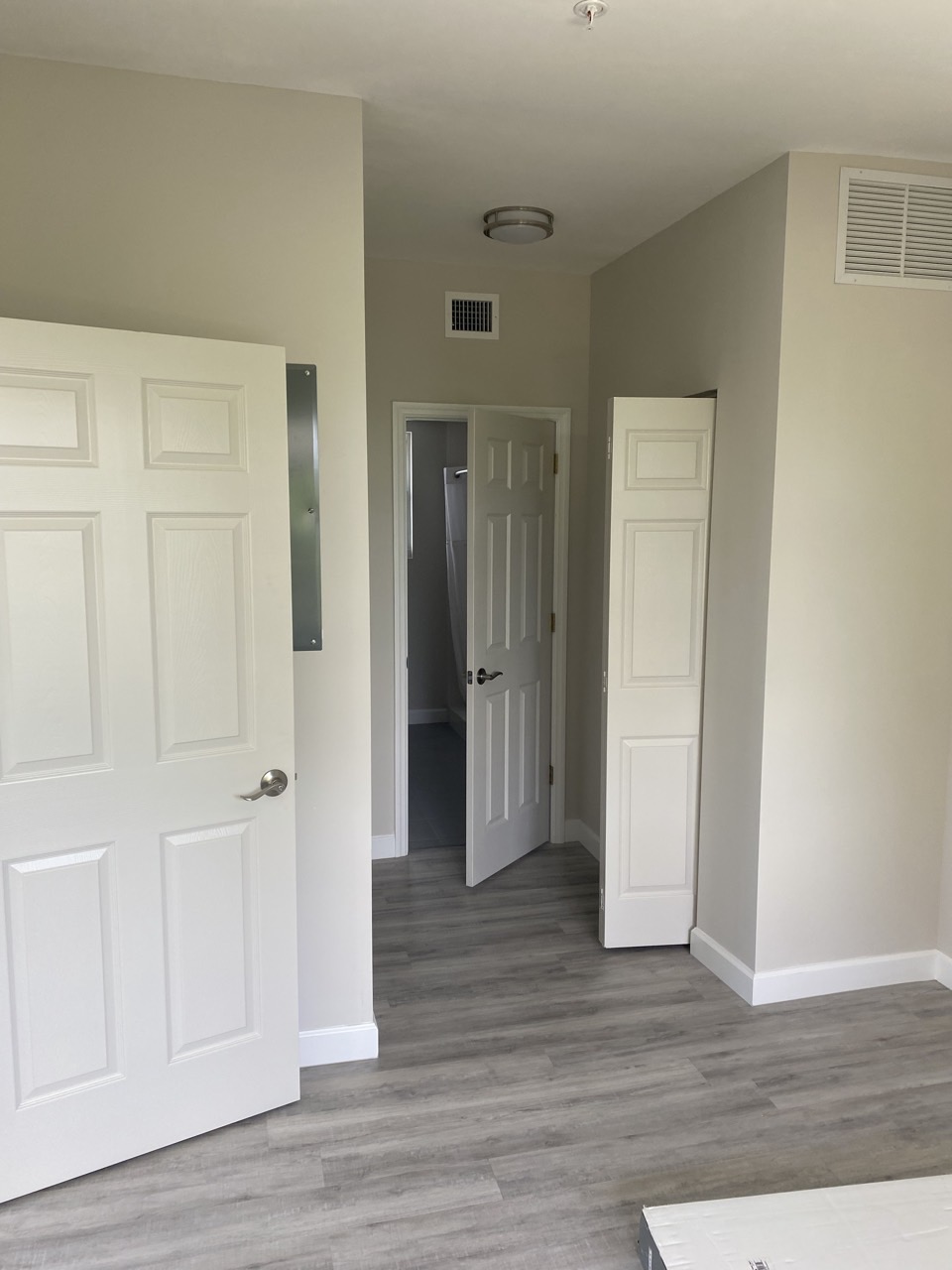 Inside a finished unit, with new flooring, doors and trim.